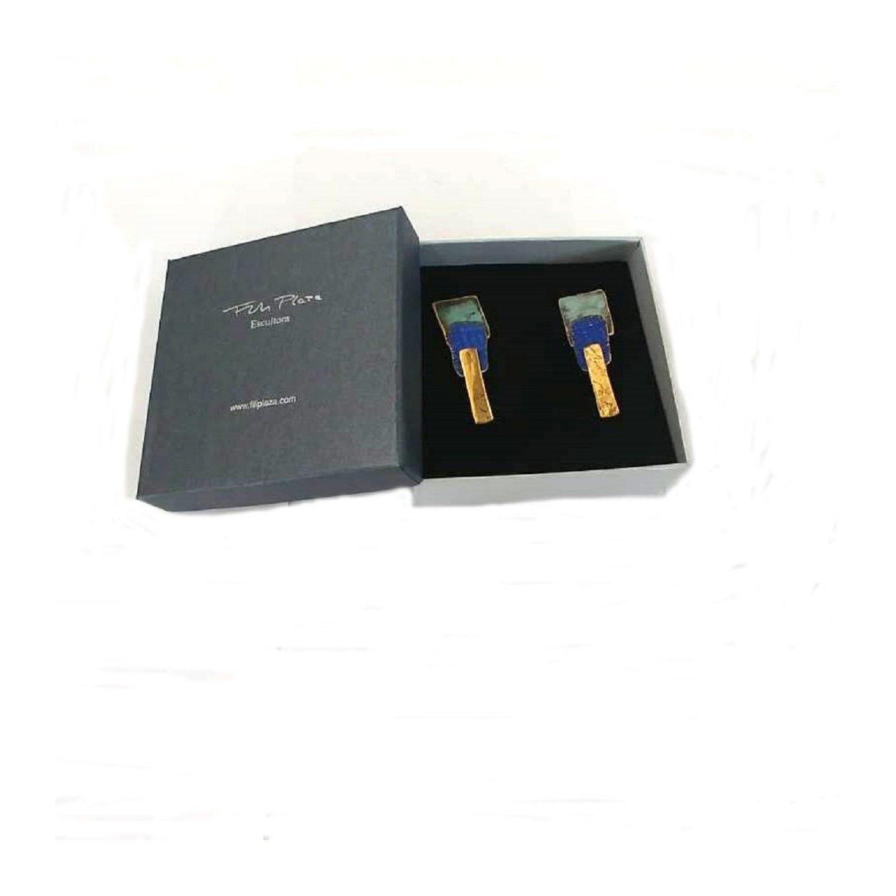 BOUCLES D'OREILLES TRES CAPES